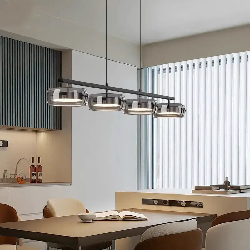 Modern black metal pendant lamp with four frosted glass shades offering cold white and warm white lighting options