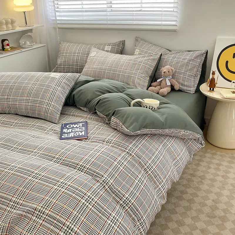 DecorBites™ nordic plaid cotton bedding set with muted green duvet and earthy beige, brown, and gray pillows
