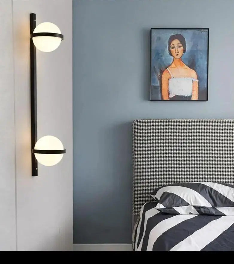 Black DecorBites™ nordic planter light sconce with two white glass spherical shades wall-mounted for modern decor