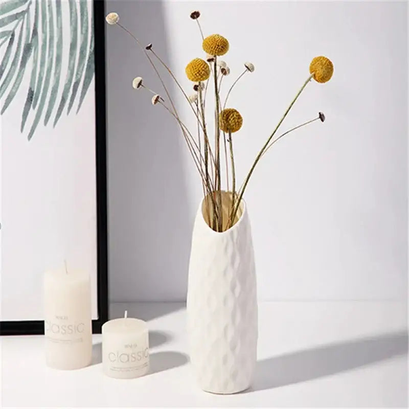 White ceramic nordic plastic vase with a textured diamond pattern and sleek tapered shape for modern home decor
