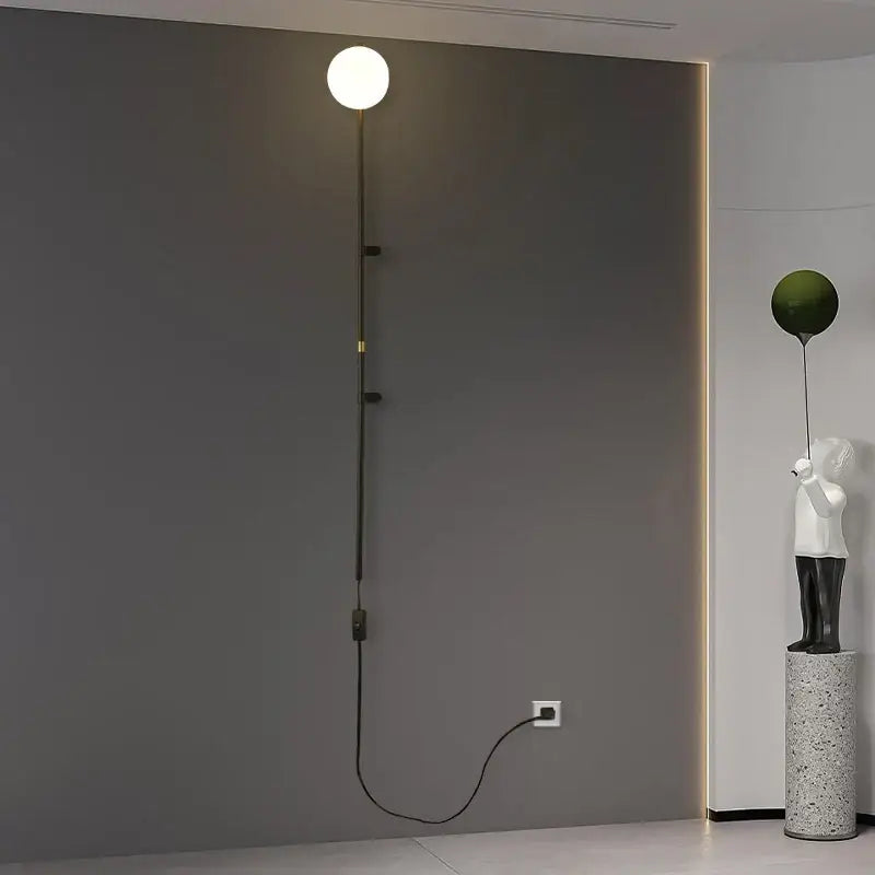 Modern minimalist DecorBites™ nordic plug in wall lamp sconce with spherical white glass bulb and black metal arm