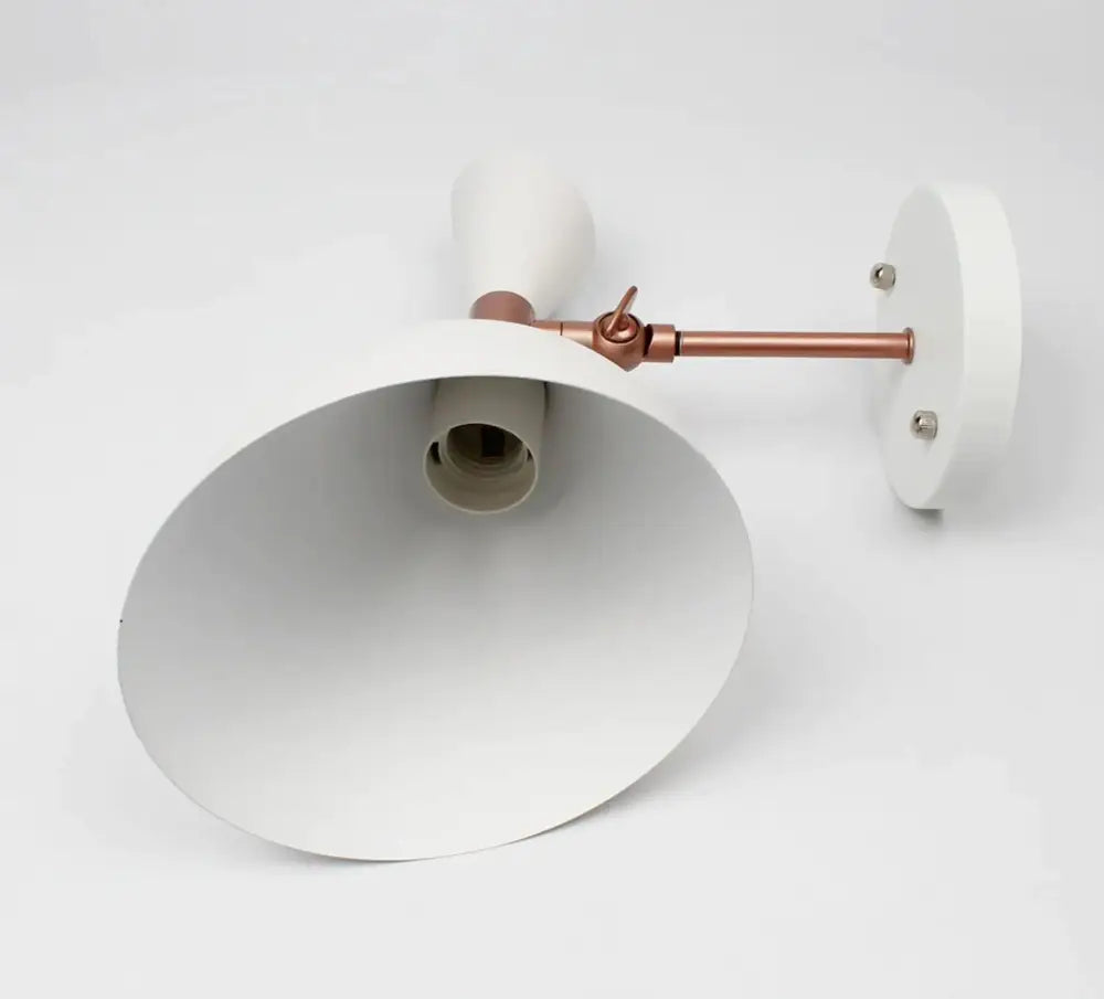 Decorbites™ nordic plug-in wall sconce with white conical shade and copper arm offers easy installation and compact size makes it ideal