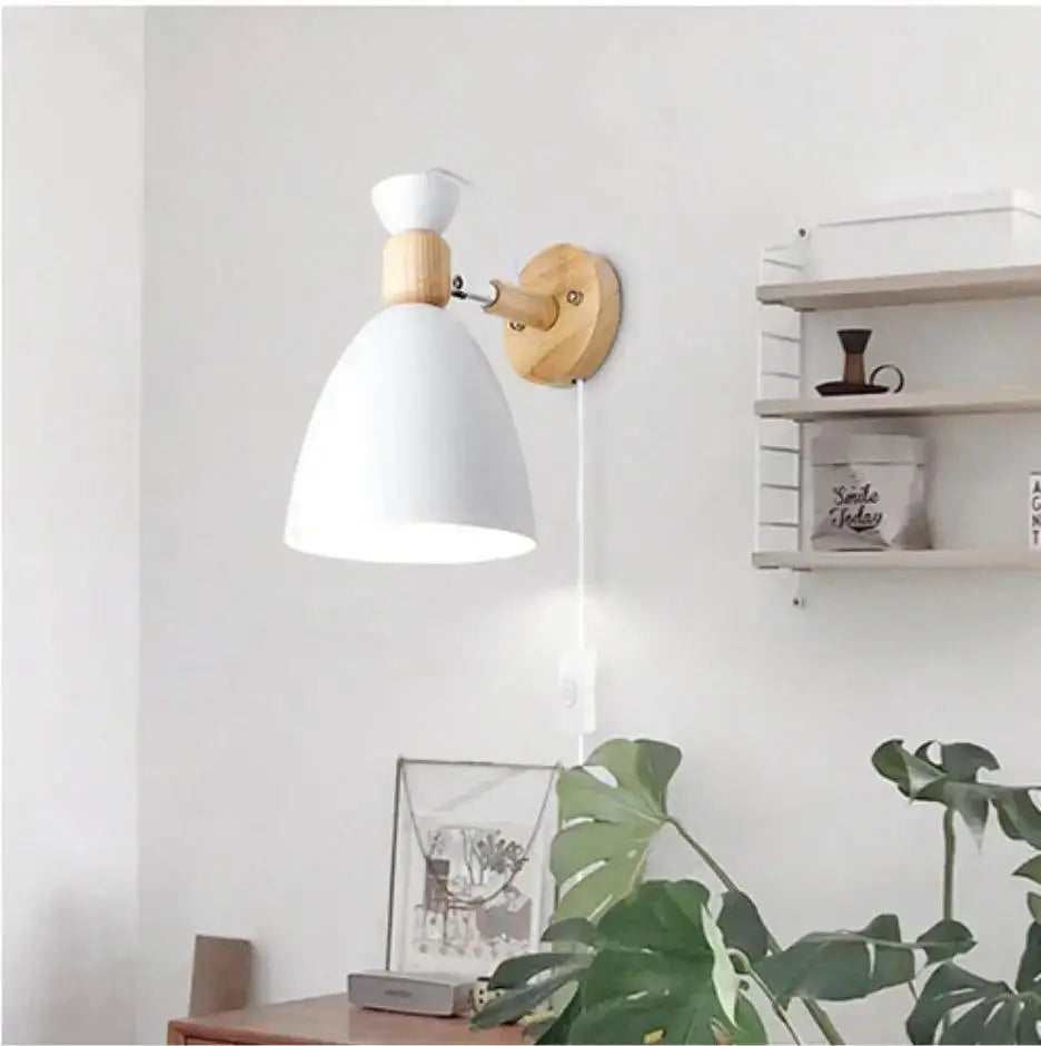 White conical metal wall sconce with wooden mount and joint nordic plug ideal for minimalist home decor