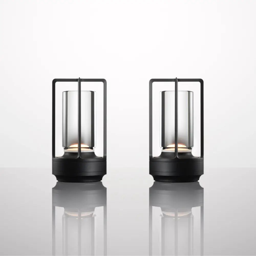 DecorBites™ nordic rechargeable table lamp with black-framed lanterns, clear glass cylinders, and warm led lights