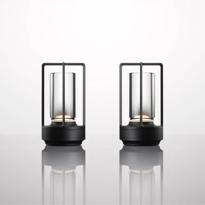 DecorBites™ nordic rechargeable table lamp with black-framed lanterns, clear glass cylinders, and warm led lights