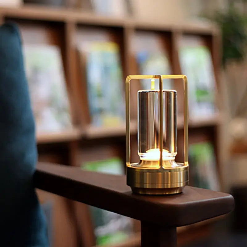 Brass-framed nordic rechargeable table lamp with clear glass cylinder and warm led light by DecorBites™