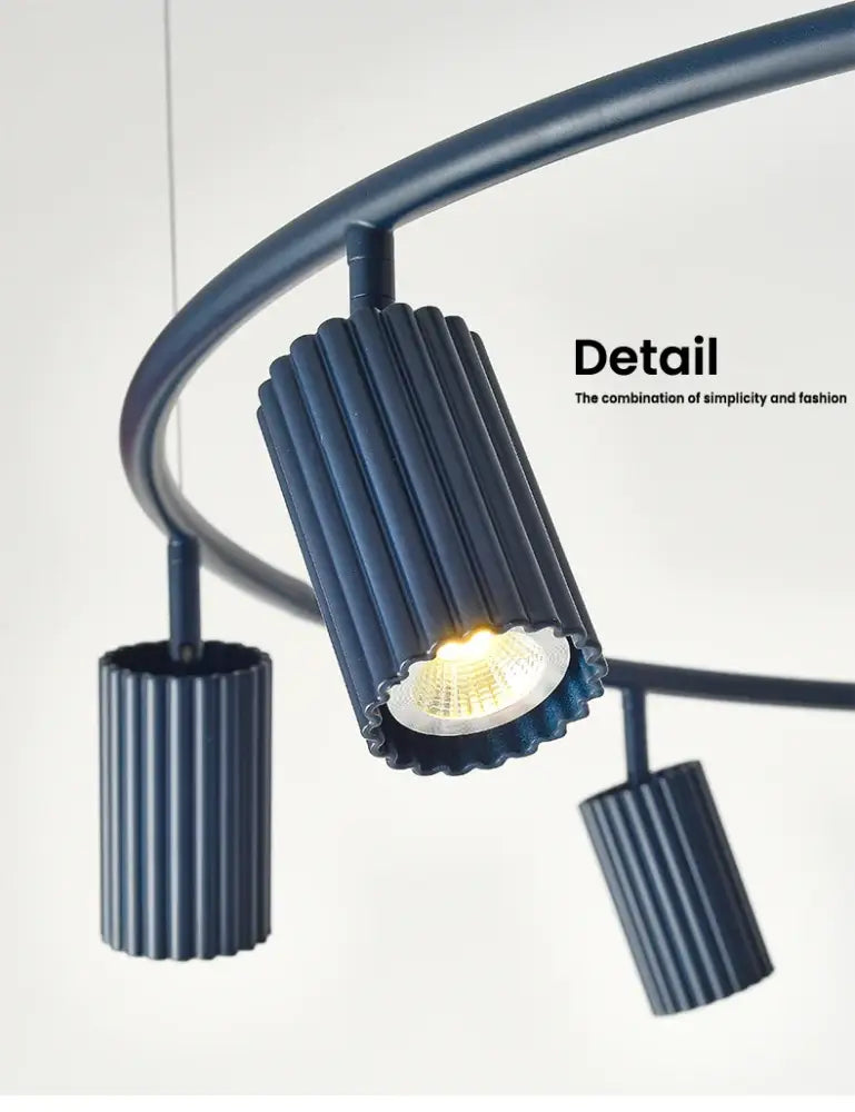 Dark blue ribbed metal decorbites™ nordic rotatable donna circle chandelier with warm glowing led bulb for dining and kitchen