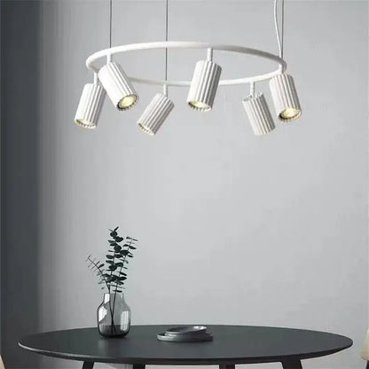 White circular donna circle chandelier with six ribbed cylindrical fixtures for dining and kitchen lighting