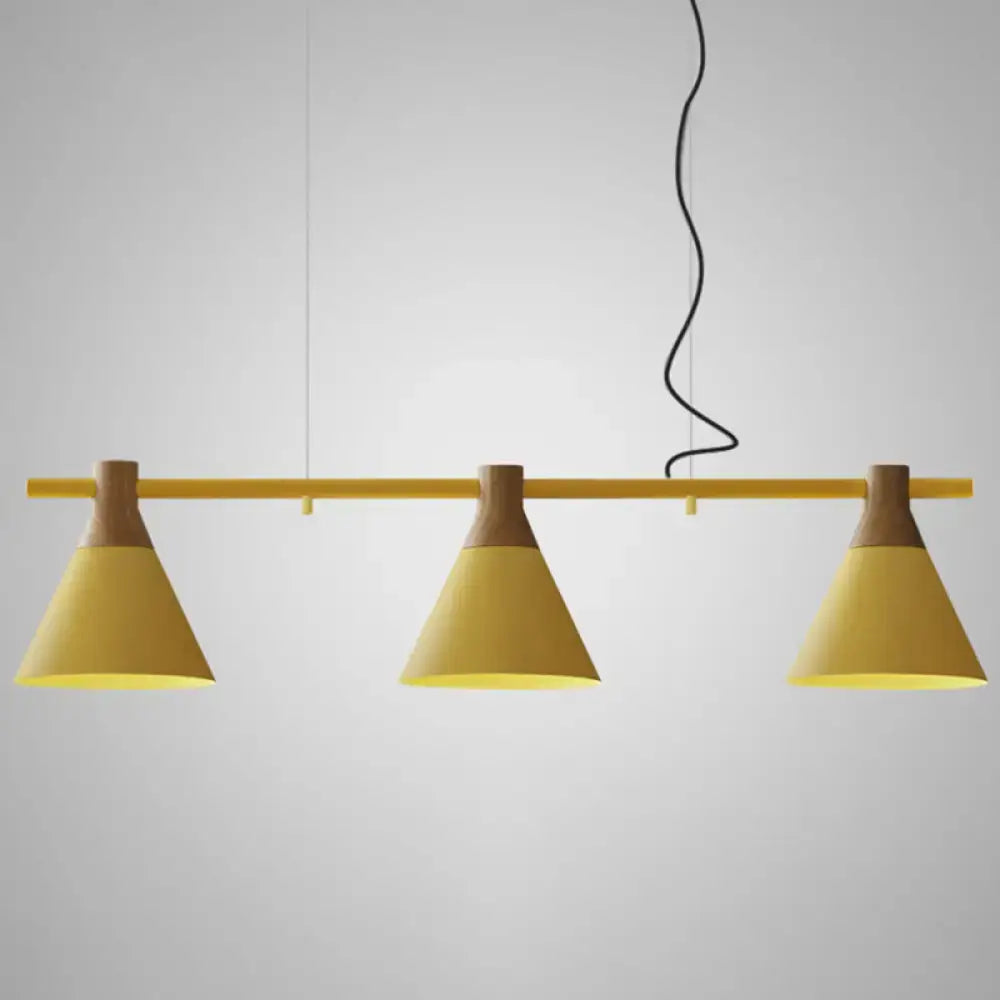 DecorBites Nordic style pendant light with three yellow conical metal shades and wooden fixtures on chain cord length