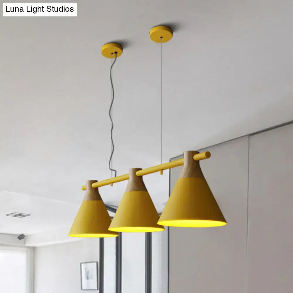 Modern yellow nordic style pendant light with wooden accents and adjustable chain cord length for versatile hanging