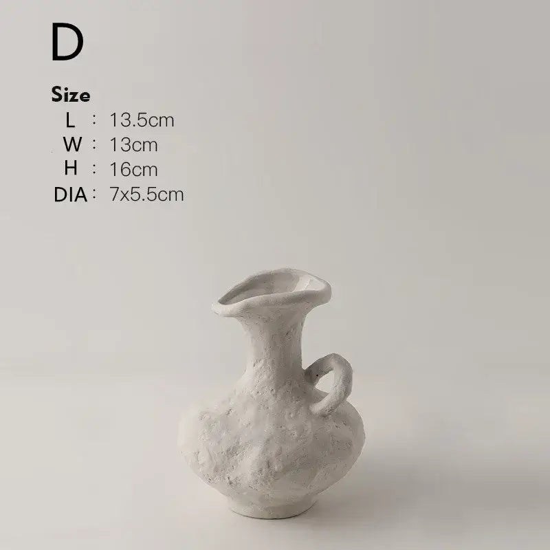 DecorBites™ nordic style ceramic flower pot in white with textured surface flared opening and small handle