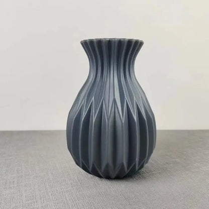 Decorbites™ nordic style ceramic flower vase in matte dark gray with a geometric faceted design and fluted rim