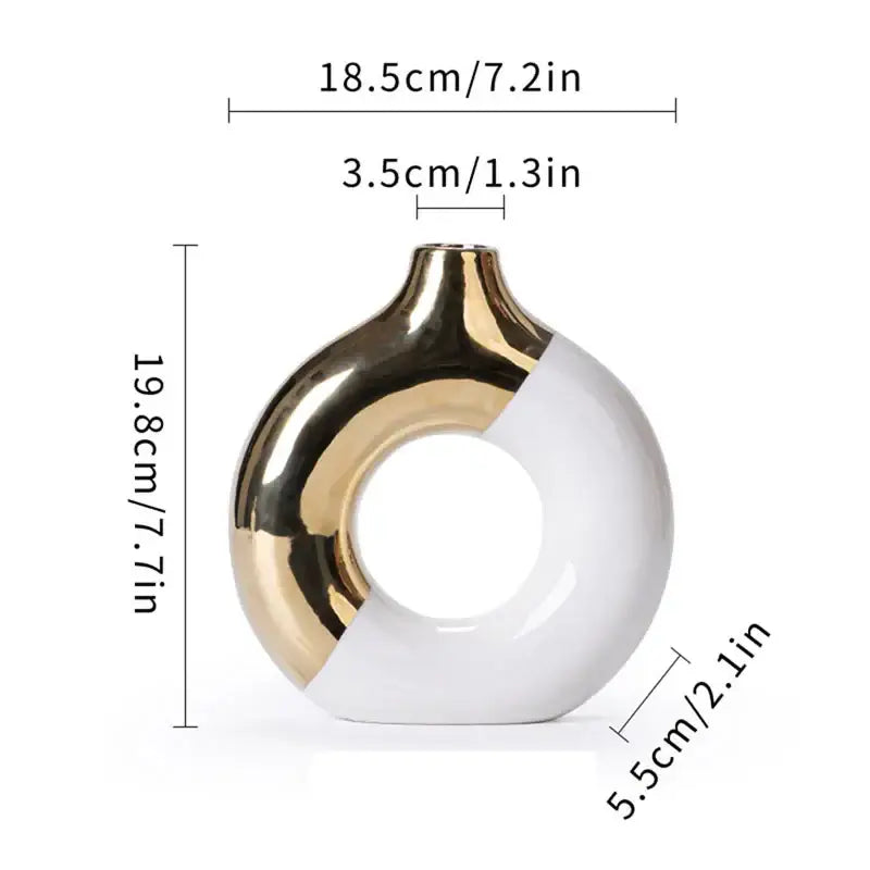 A sleek nordic style circle vase by DecorBites with glossy white ceramic and metallic gold ring design for flower arrangement