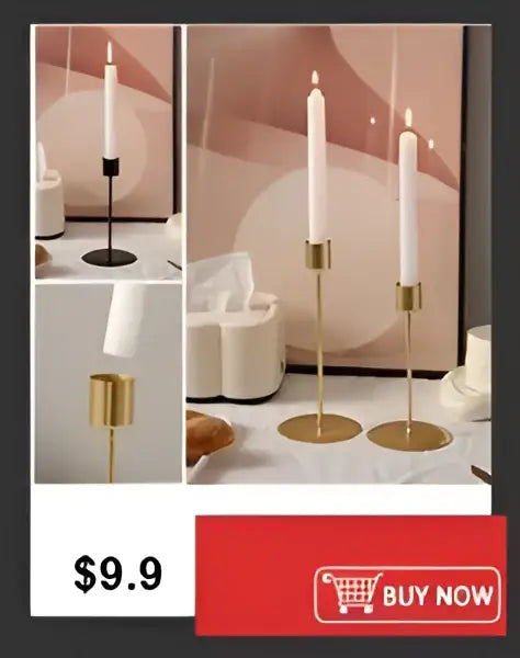 Gold-toned candle holders with sleek minimalist design and circular bases complement a plastic flower vase for home decor