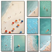 Set of eight DecorBites™ wall art prints featuring vibrant turquoise waters and beach umbrellas in a minimalist style