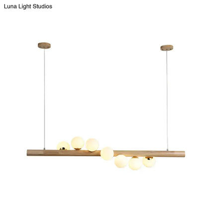 DecorBites Nordic wood island pendant in beige with six warm glass globes and adjustable chain cord length for dining room