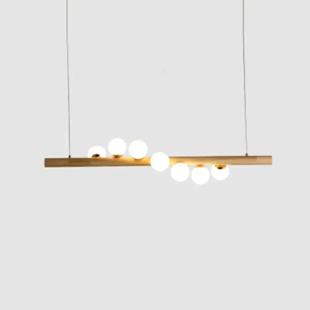 Decorbites nordic wood island pendant in beige with chain cord length features spherical glass bulbs for dining room lighting