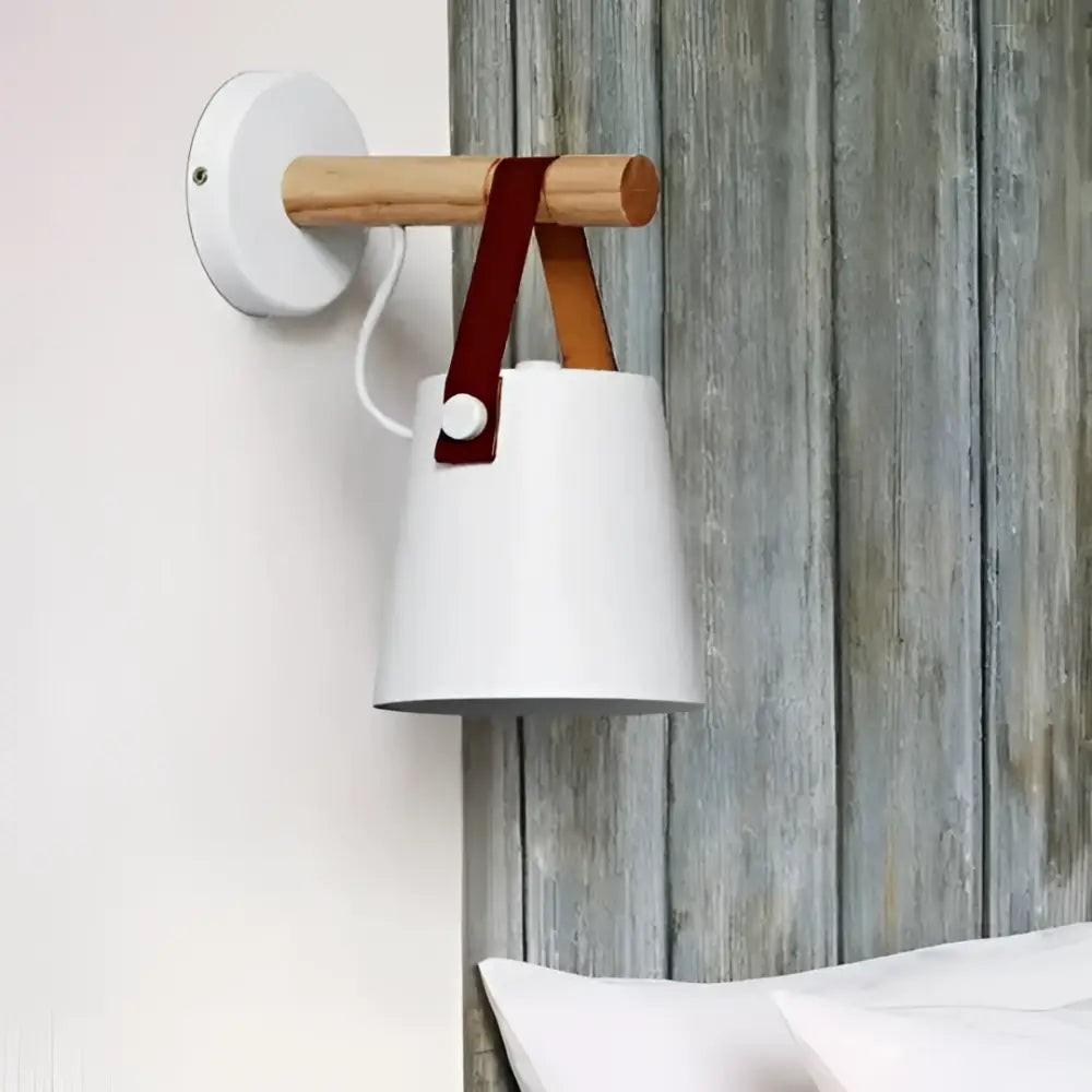 White ceramic lampshade with wooden arm and red leather strap in decorbites™ nordic wooden wall lights design