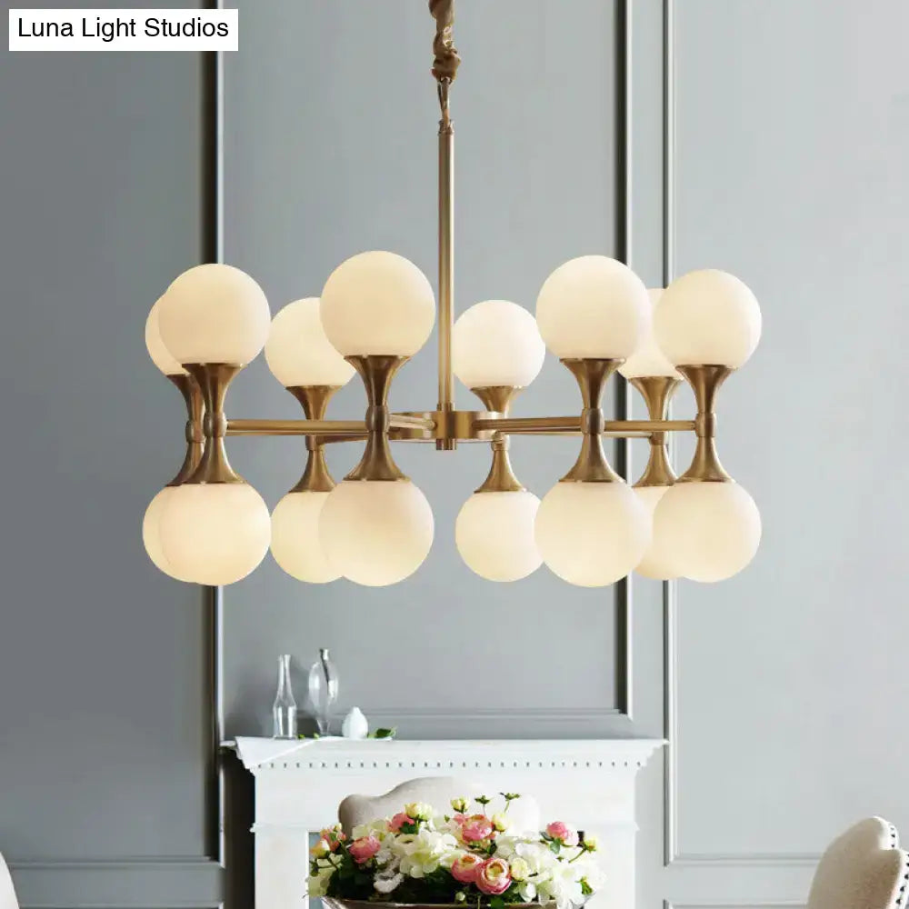 Decorbites™ opal glass chandelier light with brass finish and 12/16 frosted glass globe heads in modern design