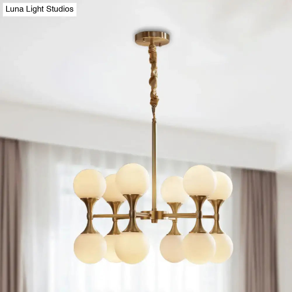 Brass-finished decorbites opal glass chandelier light with eight frosted glass globe shades in two tiers