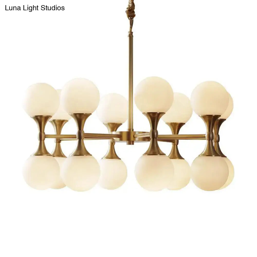Decorbites™ opal glass chandelier light with 12 brass frosted glass globe heads in a postmodern ceiling design