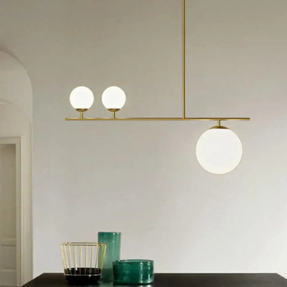 DecorBites™ opal glass globe pendant lamp with modern brass hanging lamp featuring three frosted glass globes in gold