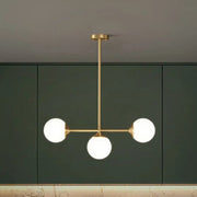 Gold-toned decorbites opaline glass ball pendant light with three frosted bulbs for minimalist dining room island
