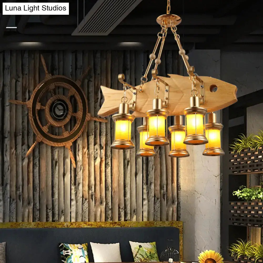 DecorBites orange glass pendant light with fish guitar design features rustic wood and brass lantern-style accents