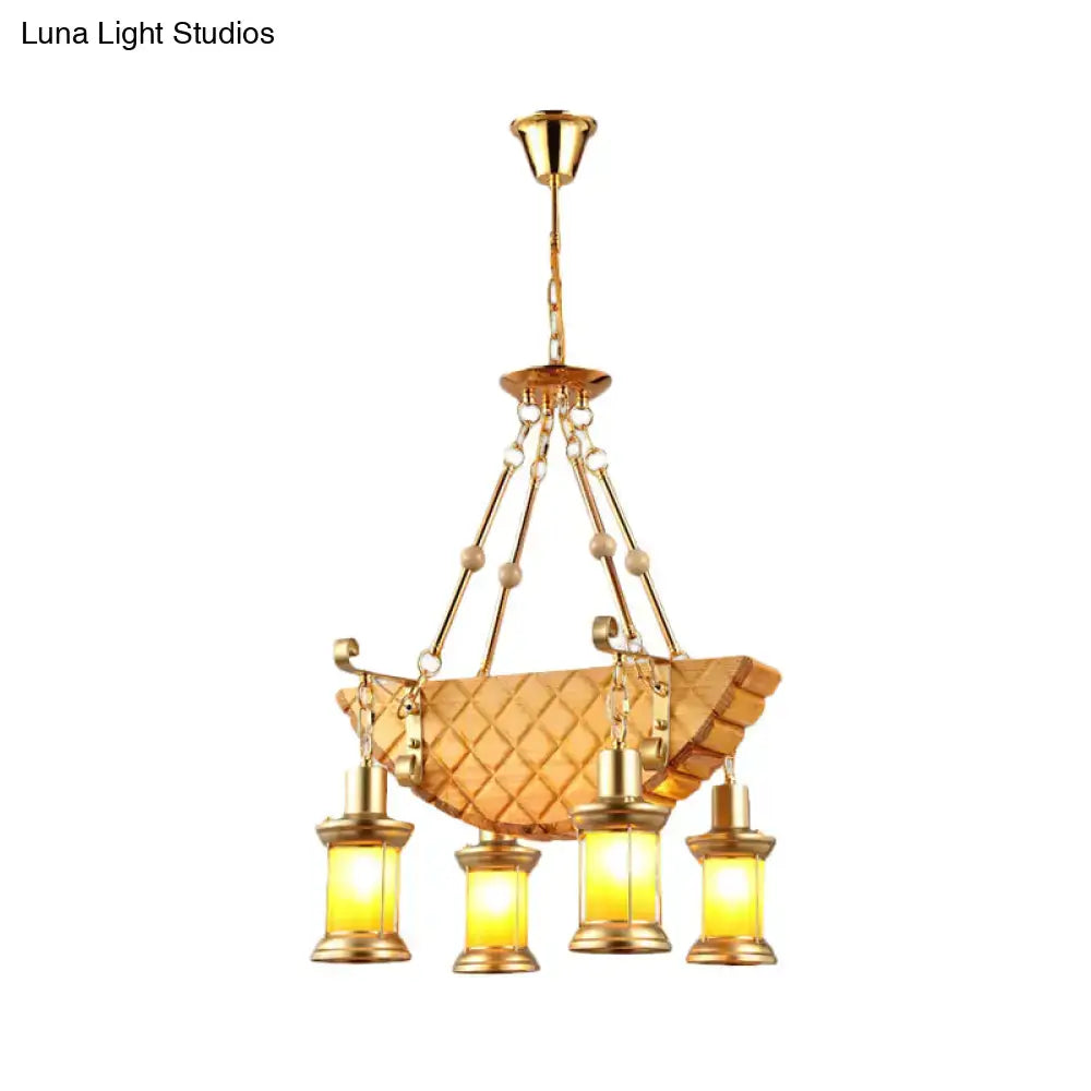 DecorBites™ orange glass pendant light with fish guitar design and quilted amber glass bowl in farm gold finish