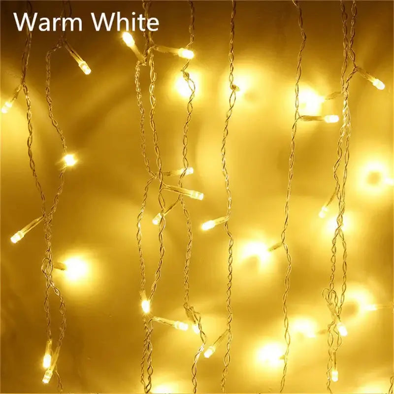 Warm white decorbites™ outdoor christmas waterfall curtain string lights with clear plastic bulbs and icicle design