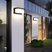 Modern black rectangular led porch light by DecorBites with warm diffused light and motion activated outdoor design