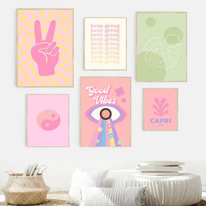 A set of six minimalist wall art posters with vibrant pink yellow green designs and pastel purple flower accents by decorbites