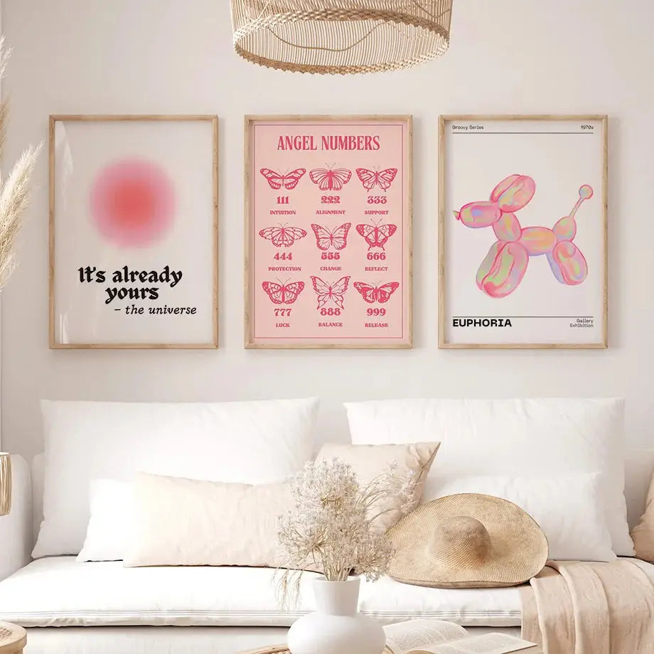 Three framed pink angel number posters with butterfly designs and pastel balloon dog gallery wall art by decorbites