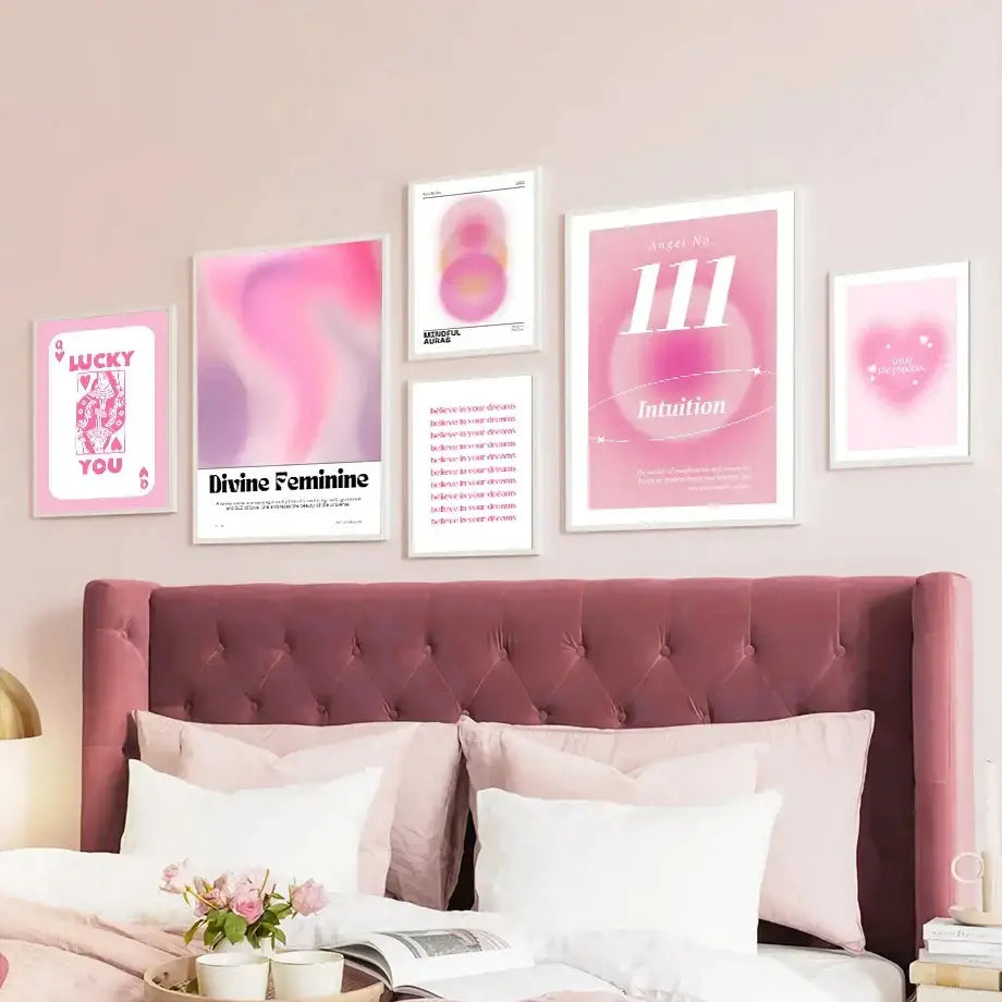Decorbites™ pink angel number poster with pink and white framed art prints arranged above a tufted headboard