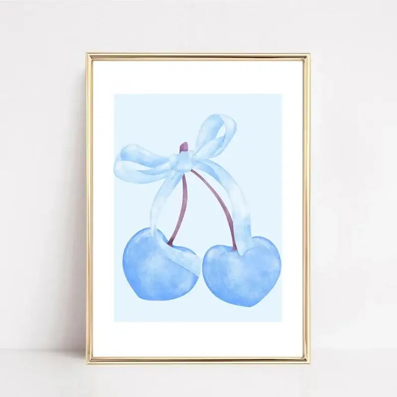 Delicate watercolor wall art of blue heart-shaped cherries tied with ribbon in gold frame from decorbites pink bows art set
