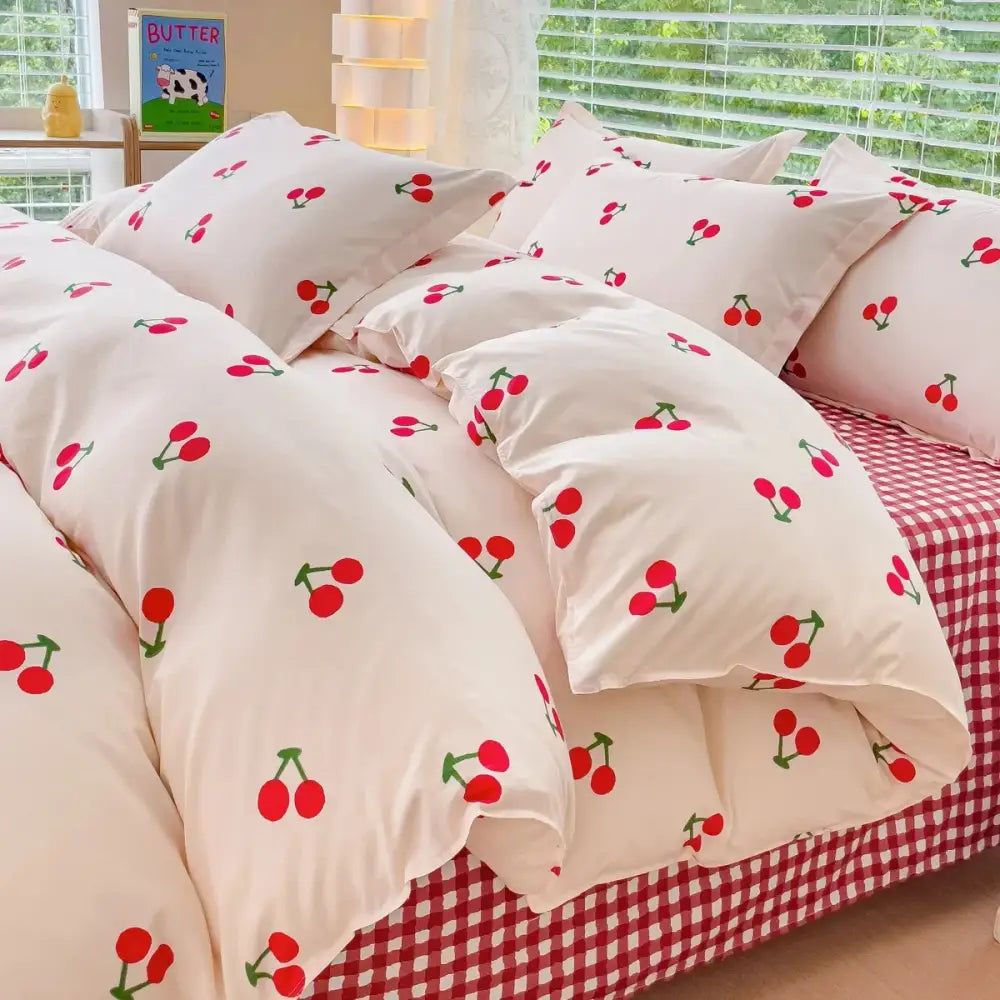 Cream-colored bedding set with playful cherry pattern in bright red and green by DecorBites™ pink floral bedding set queen size