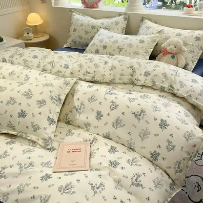 Cream-colored duvet cover set with delicate gray floral patterns from decorbites pink flowers collection for girls and boys