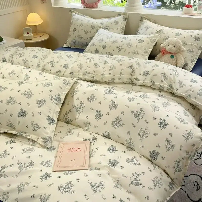 Cream-colored duvet cover set with delicate gray floral patterns from decorbites pink flowers collection for girls and boys