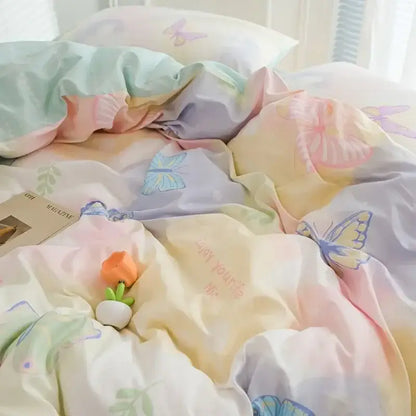 Pastel-colored duvet cover set featuring pink flowers and butterfly prints in mint, peach, lavender, and cream hues by decorbites