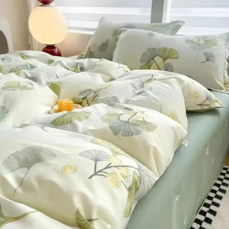 DecorBites pink flowers duvet cover set featuring a soft cream cover with green and yellow ginkgo leaf pattern and matching pillowcases