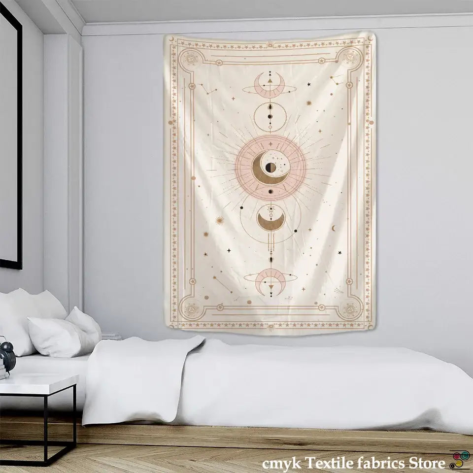 A cream-colored cream-colored tapestry with intricate pink planet tarot celestial designs hanging in a minimalist bedroom
