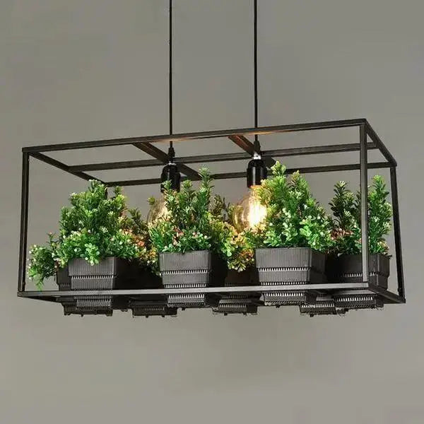 Decorbites™ planter light chandelier black metal industrial style with four glowing bulbs and green plants in gray containers