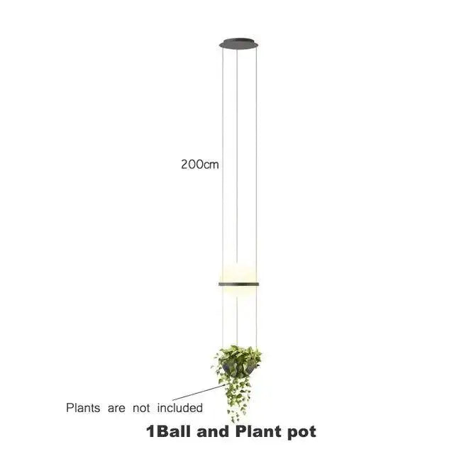 Decorbites™ planter light pendant chandelier with black circular top, two tiered illuminated rings, and hanging greenery