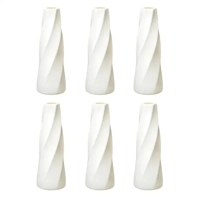 Set of six white ceramic flower vases with sleek twisted design from decorbites plastic retro flower vases collection