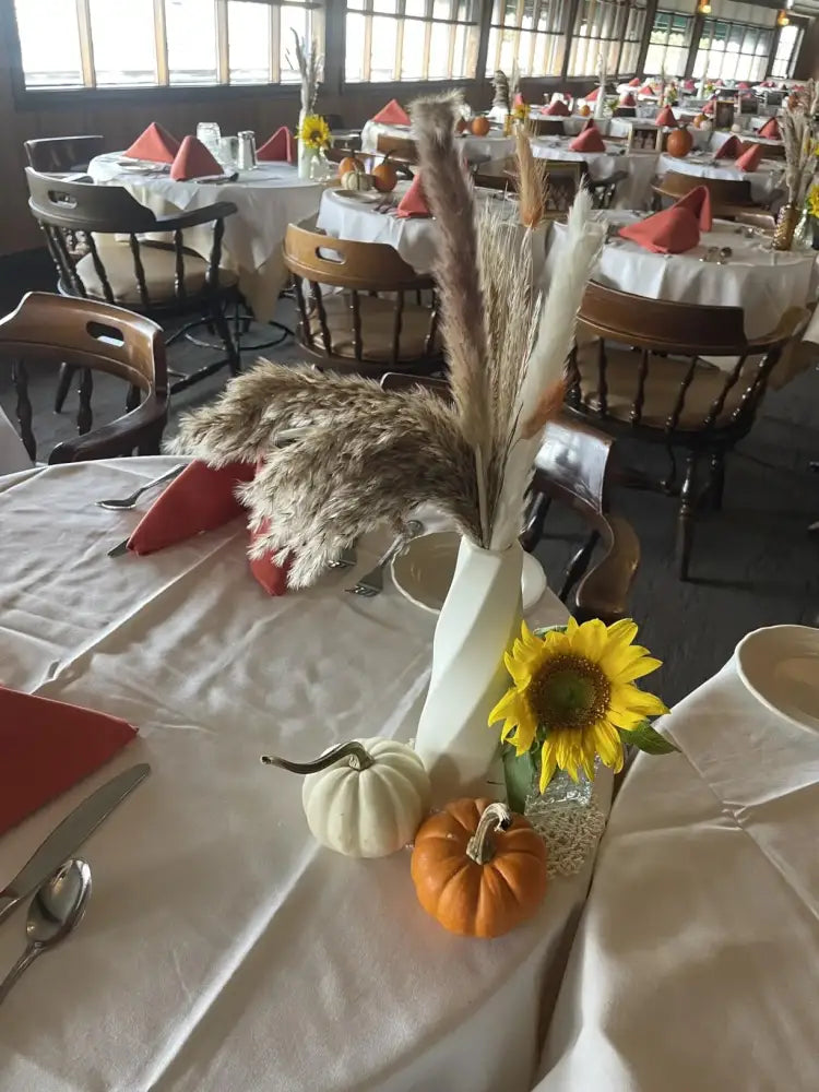 White ceramic flower vase holding dried pampas grass and sunflower for DecorBites plastic flower vases set