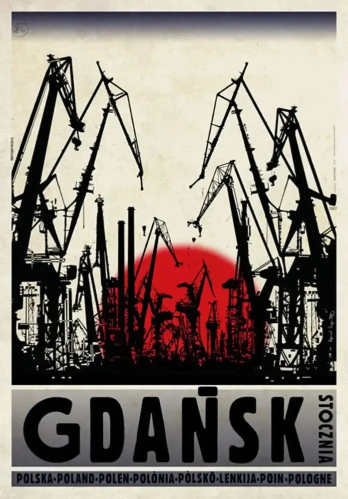 Black silhouette of industrial cranes against red sun on beige sky in decorbites™ poland city vintage posters canvas prints