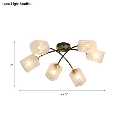 Modern decorbites semi-flush mount ceiling light with six frosted glass shades in glass material on black and brass frame