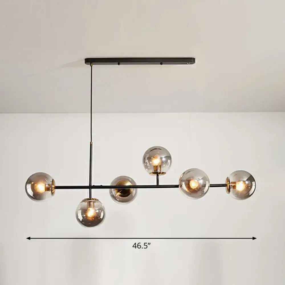 Modern black metal chandelier with six smoked glass globe bulbs by decorbites for beige grey blue dining rooms