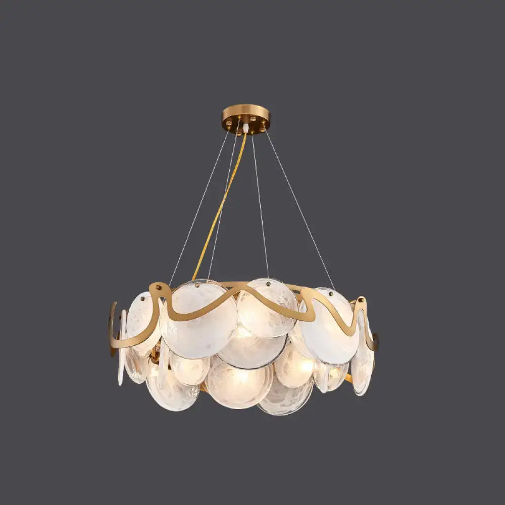 Decorbites postmodern circle pendant light with gold-toned brass and layered translucent glass discs light fixture