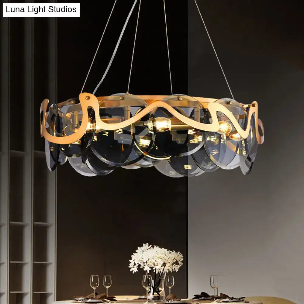DecorBites™ postmodern circle pendant light with gold-toned metal arms and dark glass discs LED light fixture